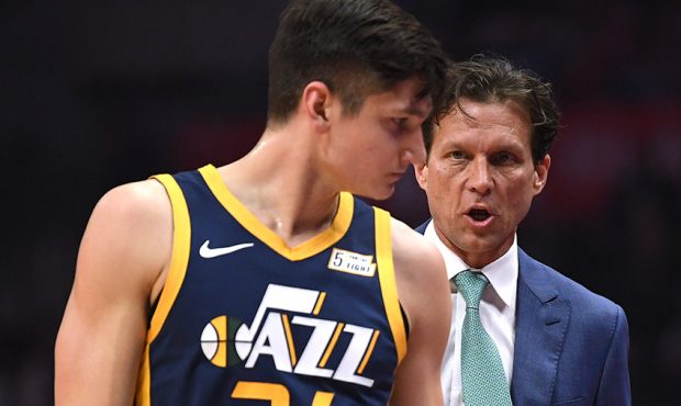 Quin Snyder of the Utah Jazz speaks with Grayson Allen #24 during the first half against the LA Cli...