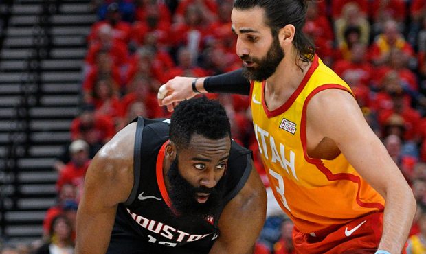 James Harden #13 of the Houston Rockets looks to get past Ricky Rubio #3 of the Utah Jazz in the se...