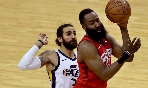 Houston Rockets guard James Harden (13) gets off a pass past Utah Jazz guard Ricky Rubio (3) during...