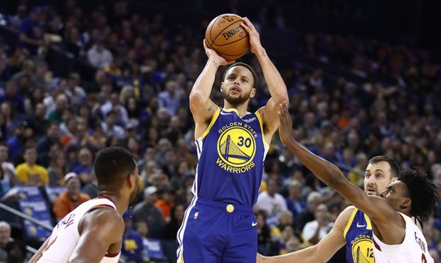 Stephen Curry #30 of the Golden State Warriors shoots against the Cleveland Cavaliers at ORACLE Are...