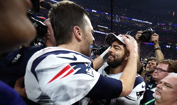Tom Brady #12 of the New England Patriots celebrates with Kyle Van Noy #53 after their teams 13-3 w...