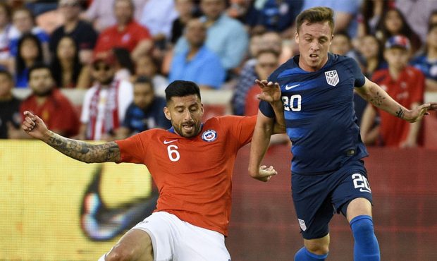 Chile defender Guillermo Maripán (6) and United States forward Corey Baird fight for possession du...