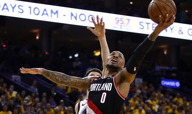 Damian Lillard #0 of the Portland Trail Blazers drives to the basket during the second half against...