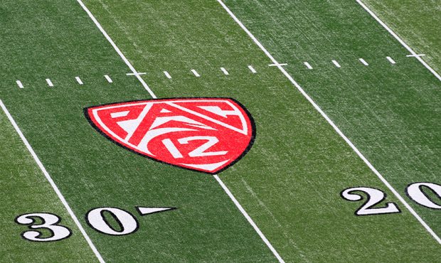 Pac-12 Logo on the field at Rice-Eccles Stadium...