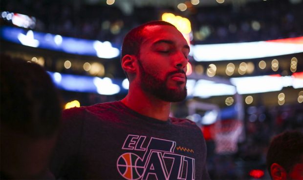 Utah Jazz center Rudy Gobert (27) stands for the national anthem before playing the Minnesota Timbe...