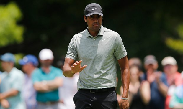 Tony Finau of the United States reacts after a putt on the third green during the final round of th...