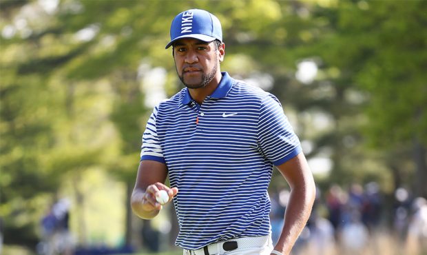 Tony Finau of the United States ball wave on the 14th green during the second round of the 2019 PGA...