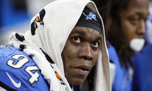 Ezekiel Ansah #94 of the Detroit Lions looks up at the score board in the closing minutes of the ga...