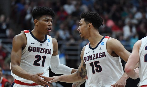 Rui Hachimura #21 and Brandon Clarke #15 of the Gonzaga Bulldogs celebrate after a play against the...