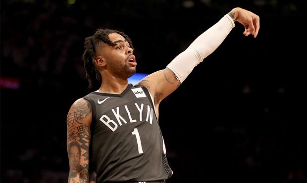 D'Angelo Russell #1 of the Brooklyn Nets shoots a three point shot in the first half against the Ph...