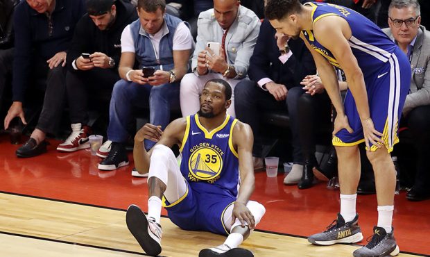 Kevin Durant #35 of the Golden State Warriors reacts against the Toronto Raptors in the first half ...