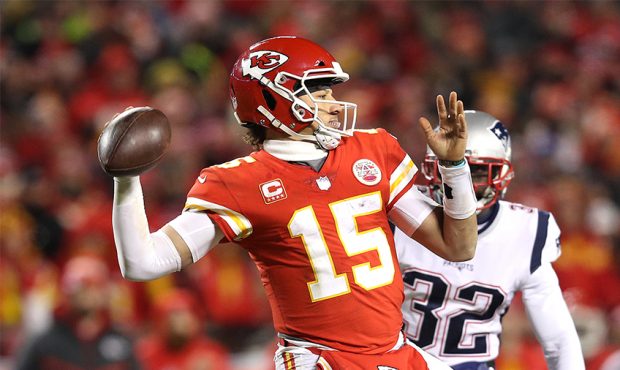 Patrick Mahomes #15 of the Kansas City Chiefs looks to pass in the second half against the New Engl...