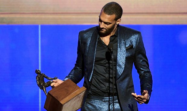 Rudy Gobert accepts the Kia NBA Defensive Player of the Year award onstage during the 2019 NBA Awar...