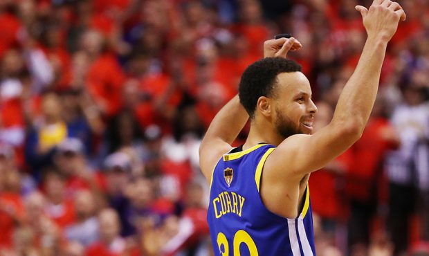 Stephen Curry #30 of the Golden State Warriors reacts against the Toronto Raptors in the second hal...