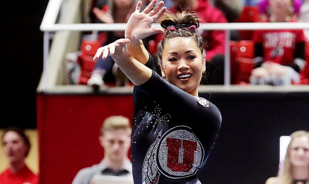 Kari Lee performs her floor routine as Utah and Michigan battle it out in Gymnastics at the Huntsma...