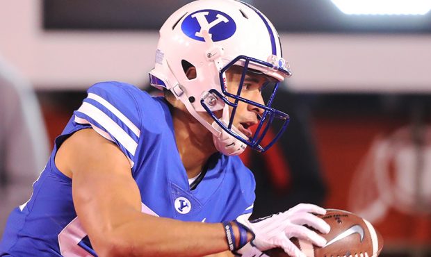 Brigham Young Cougars wide receiver Neil Pau'u (84) makes a catch going out of the end zone for a s...