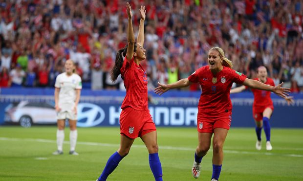 Christen Press of the USA celebrates with teammate Lindsey Horan after scoring her team's first goa...