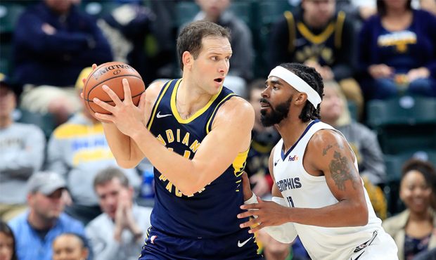 Bojan Bogdanovic #44 of the Indiana Pacersis defended by Mike Conley #11 of the Memphis Grizzlies a...