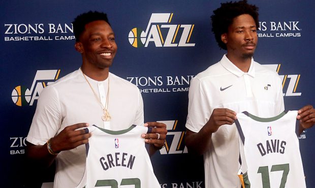 New Utah Jazz forward Jeff Green and center/forward Ed Davis pose for a photo with their jerseys du...