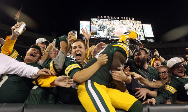 GREEN BAY, WI - SEPTEMBER 20: James Jones #89 of the Green Bay Packers celebrates with fans after s...