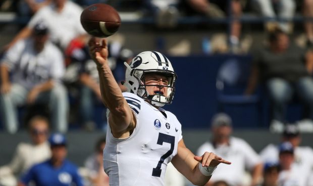 Brigham Young Cougars quarterback Beau Hoge (7) fires off a pass during the game against the Wiscon...