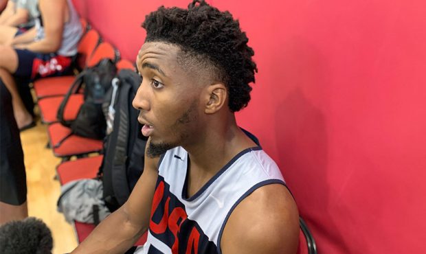 Utah Jazz guard Donovan Mitchell talks to reporters after participating in training camp for the US...