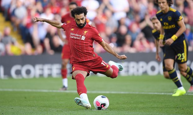 Mohamed Salah of Liverpool scores from the penalty spot during the Premier League match between Liv...