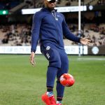 MELBOURNE, AUSTRALIA - AUGUST 23: Donovan Mitchell of Team USA Basketball is seen during the 2019 AFL round 23 match between the Collingwood Magpies and the Essendon Bombers at the Melbourne Cricket Ground on August 23, 2019 in Melbourne, Australia. (Photo by Michael Willson/AFL Photos via Getty Images)