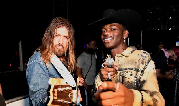Billy Ray Cyrus (L) and Lil Nas X pose backstage during the 2019 Stagecoach Festival at Empire Polo...