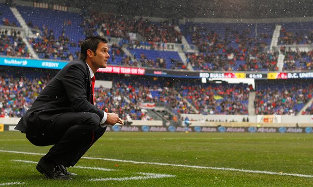 Head coach Mike Petke of New York Red Bulls watches from the sidelines against the D.C. United at R...