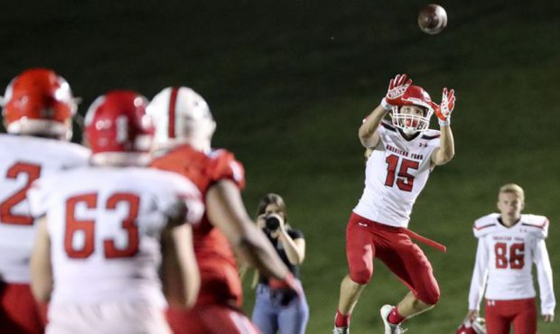 American Fork’s Devin Downing catches a pass during a football game against East High School at E...