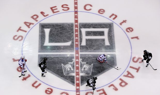 LOS ANGELES, CA - JUNE 04:  The New York Rangers skate over the center ice logo against the Los Ang...