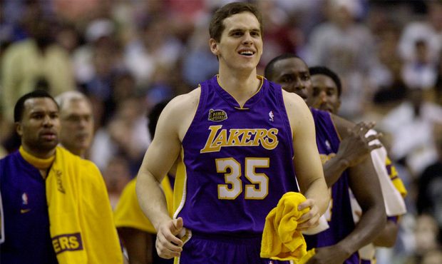 Mark Madsen #35 of the Los Angeles Lakers celebrates from the bench in game four of the NBA Finals ...