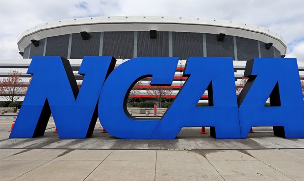 A detail of giant NCAA logo is seen outside of the stadium on the practice day prior to the NCAA Me...
