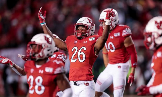 Utah Utes defensive back Terrell Burgess (26) and teammates hype up the crowd at the end of the thi...