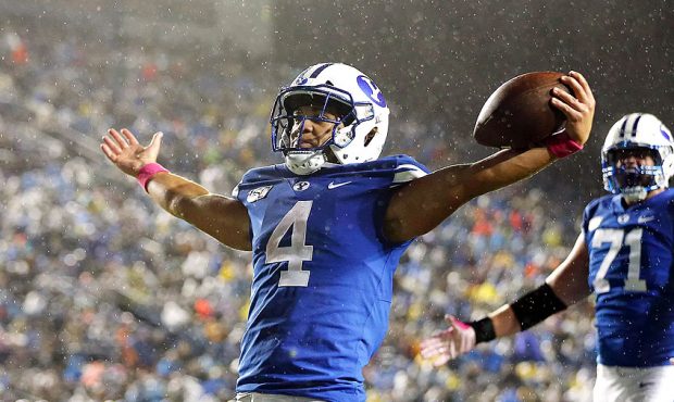 Brigham Young Cougars running back Lopini Katoa celebrates scoring a touchdown against the Boise St...