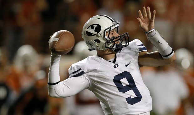 Quarterback Jake Heaps #9 of the BYU Cougars throws a long pass against the Texas Longhorns on Sept...