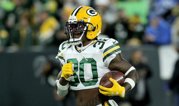 Jamaal Williams #30 of the Green Bay Packers warms up before the game against the Detroit Lions at ...