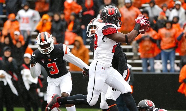 Joe Williams #28 of the Utah Utes scores a touchdown against the Oregon State Beavers at Reser Stad...