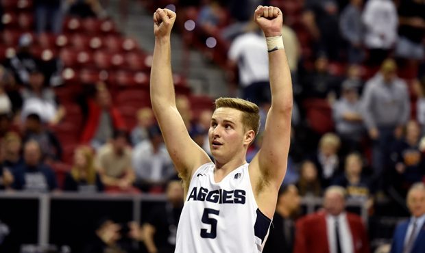 Sam Merrill #5 of the Utah State Aggies reacts in the final seconds of the championship game of the...