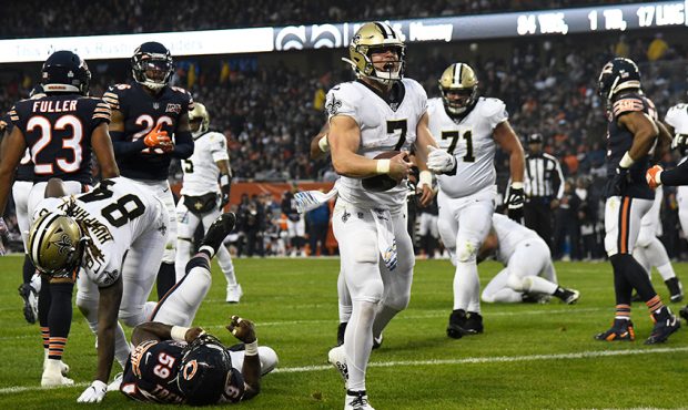 Taysom Hill #7 of the New Orleans Saints celebrates his touchdown against the Chicago Bears during ...