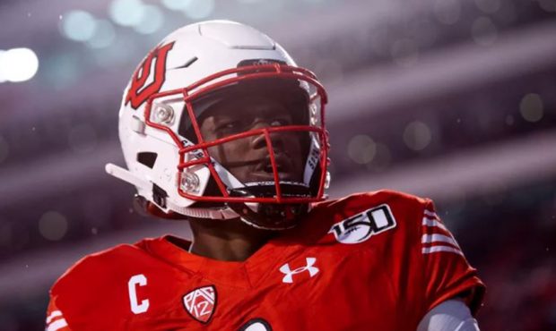 Utah Utes quarterback Tyler Huntley (1) celebrates after running the ball 15 yards for a touchdown,...