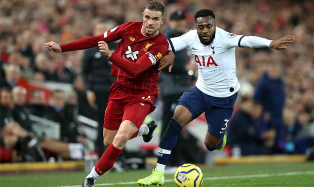 Jordan Henderson of Liverpool battles with Danny Rose of Tottenham Hotspur during the Premier Leagu...