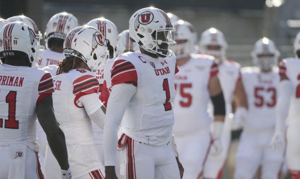 Utah Utes quarterback Tyler Huntley (1) warms up prior to the game with the Washington Huskies in S...