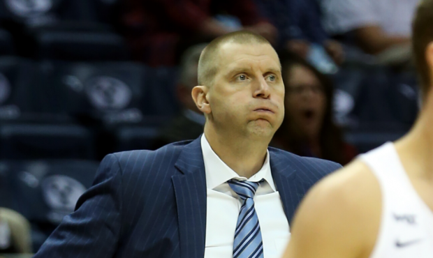 Brigham Young Cougars head coach Mark Pope blows out a breath as BYU and Cal State Fullerton play a...