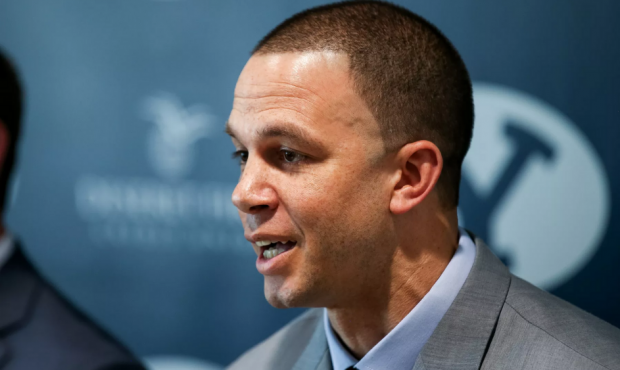 Newly hired Brigham Young University basketball assistant coach Nick Robinson speaks at a press con...