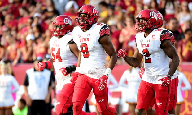 Bubba Poole #8 of the Utah Utes reacts to his touchdown to take a 14-7 lead over the USC Trojans wi...