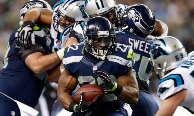 Robert Turbin #22 of the Seattle Seahawks runs the ball against the Carolina Panthers during the 20...