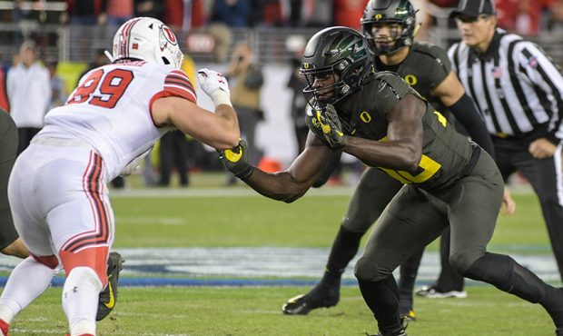 Oregon Ducks defensive tackle Popo Aumavae (50) blocks the left side of the field during the Pac-12...