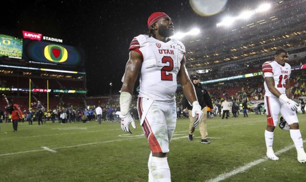 Utah Utes running back Zack Moss (2) walks off the field following the Pac-12 Championship game aga...